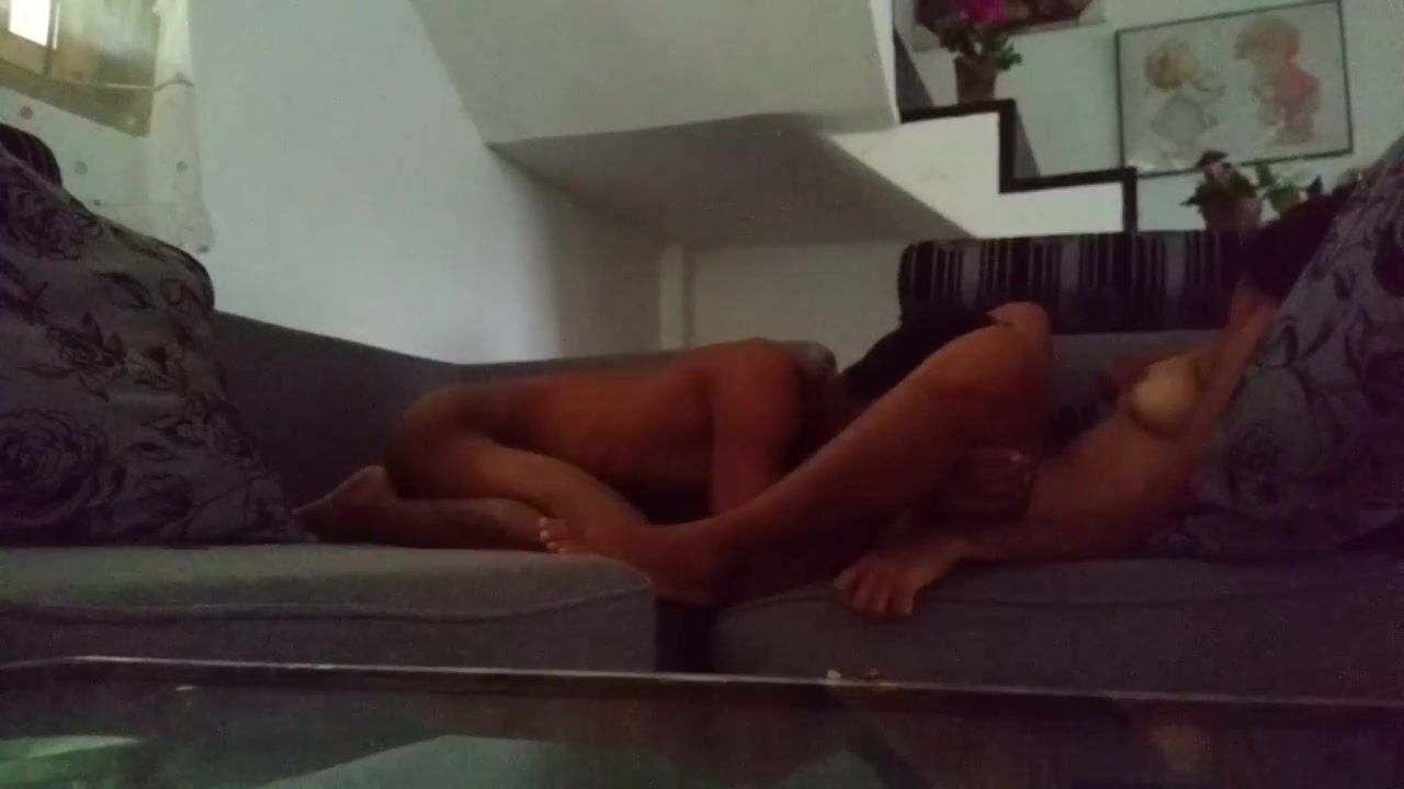 Their bodies intertwine in a moment of desire