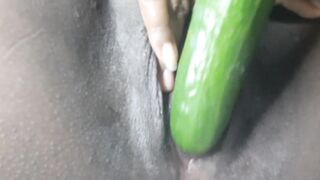 Petty girl playing with Gherkin
